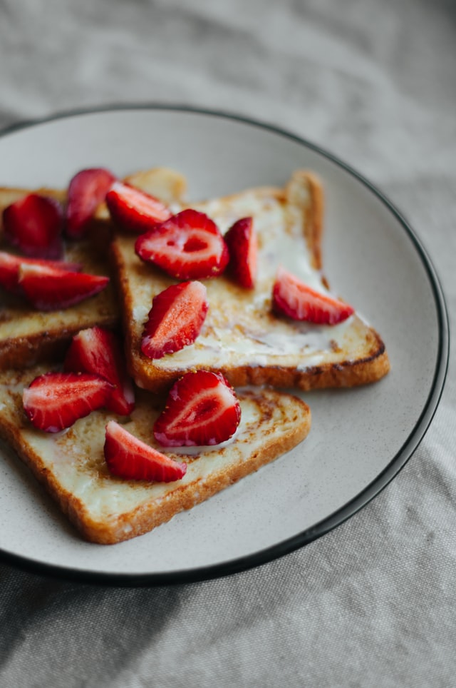 Plate of French toast with strawberries